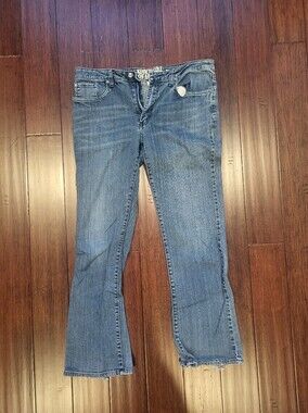 Kenneth Cole Men’s Bootcut Jeans in Medium Blue